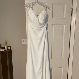 Bridal size 10. Never worn or altered